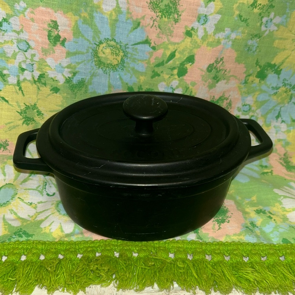 Nouvelle cuisine black crock with lid.